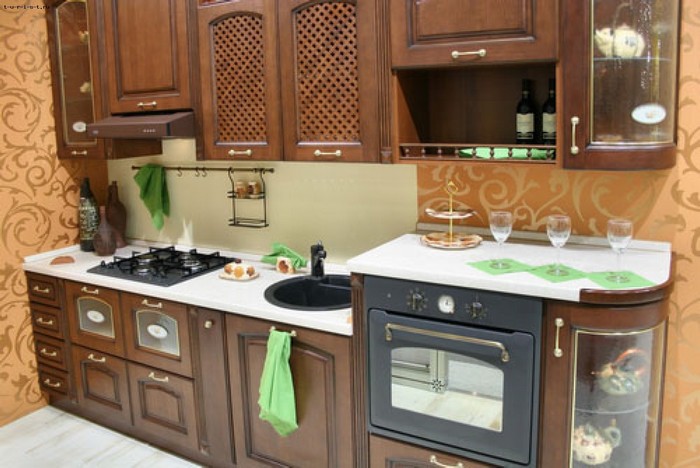 a small wooden kitchen