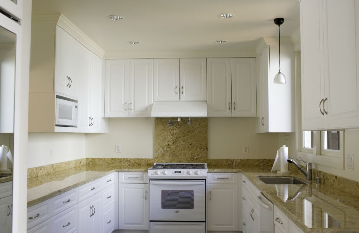 white U shaped kitchen