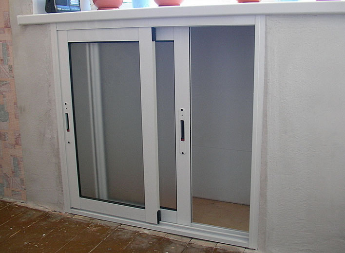 Niche under the window with door