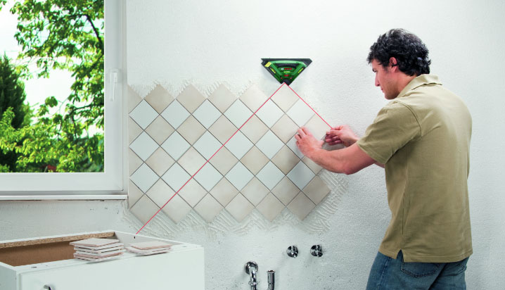 Master puts an apron in the kitchen